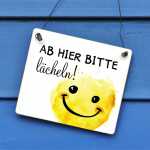 Schild Ab hier bitte lächeln