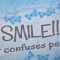 Schild aus Holz SMILE - IT CONFUSES PEOPLE 13,5 x 15,5 x 0,4 cm